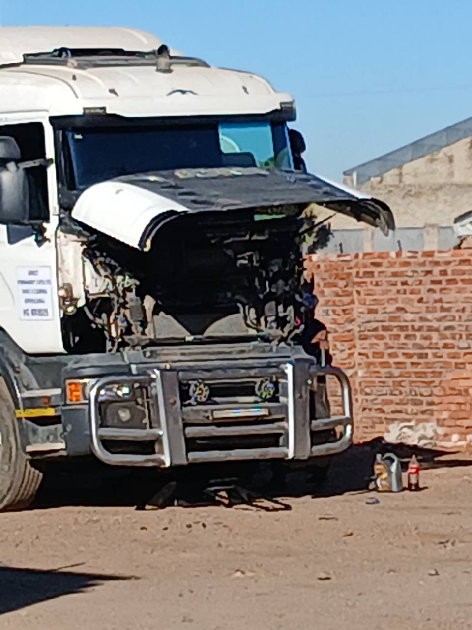 Heavy-duty truck with its front panels removed during repair by RichAutoTruck